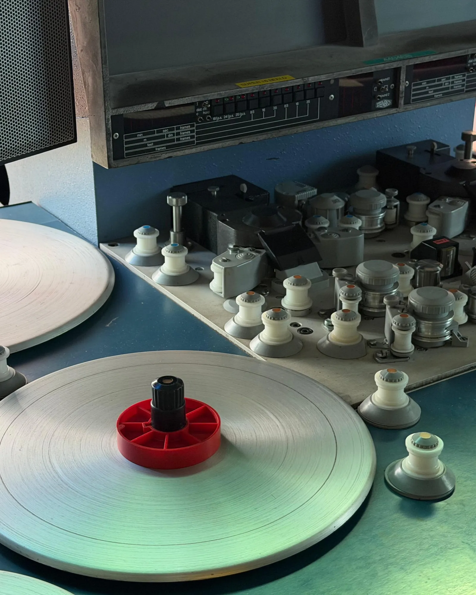 Visit to Sound & Vision: tape reels and spools on a restoration desk.